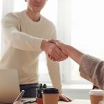 shaking hands after a business deal